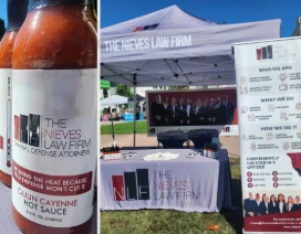 Nieves Law Firm hot sauce and the firm booth at Bizerkeley Food Fest in Berkeley