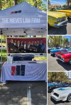 The Nieves Law Firm booth and classic cars at Hot Rancho Nights at Rancho Solano Golf Course in Fairfield